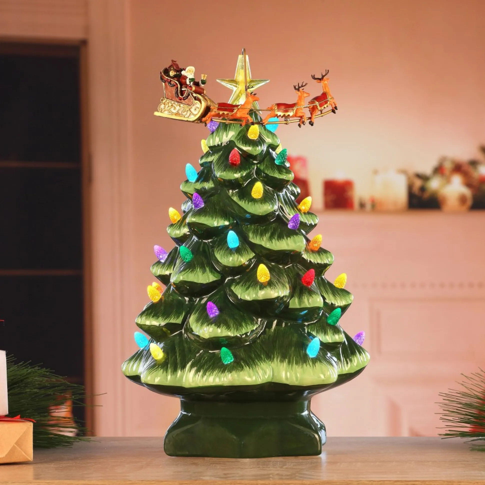 animated_nostalgic_ceramic_tree__santas_sleigh_1-1.webp Clearance Mr. Christmas 14" Animated Nostalgic Ceramic Tree - Santa's Sleigh